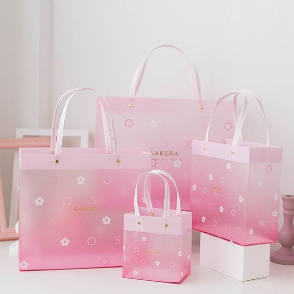 12pcs/lot pink romantic transparent birthday portable plastic bag pvc sakura rivet pp gift clothing store packaging wrap
12pcs/lot pink romantic transparent birthday portable plastic bag pvc sakura rivet pp gift clothing store packaging wrap