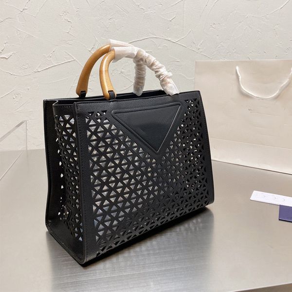 2022triangle hollow tote women large totes bag handbag shopping bags ladies handbags ladies leather big geometric shape clutch
2022triangle hollow tote women large totes bag handbag shopping bags ladies handbags ladies leather big geometric shape clutch