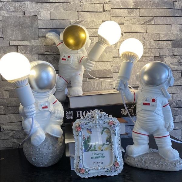 table lamps space station astronaut led creative light for children's baby bedroom living room art deco resin lamp
table lamps space station astronaut led creative light for children's baby bedroom living room art deco resin lamp