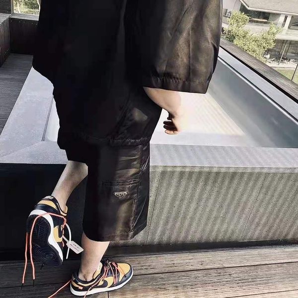 21s spring summer new p triangle name plate nylon shorts capris men's and women's lovers style chaogao street, Black
21s spring summer new p triangle name plate nylon shorts capris men's and women's lovers style chaogao street, Black
