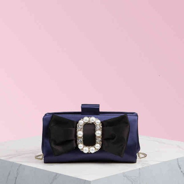 evening bags women women's pearl buckle soft color matching fashion boutique portable
evening bags women women's pearl buckle soft color matching fashion boutique portable