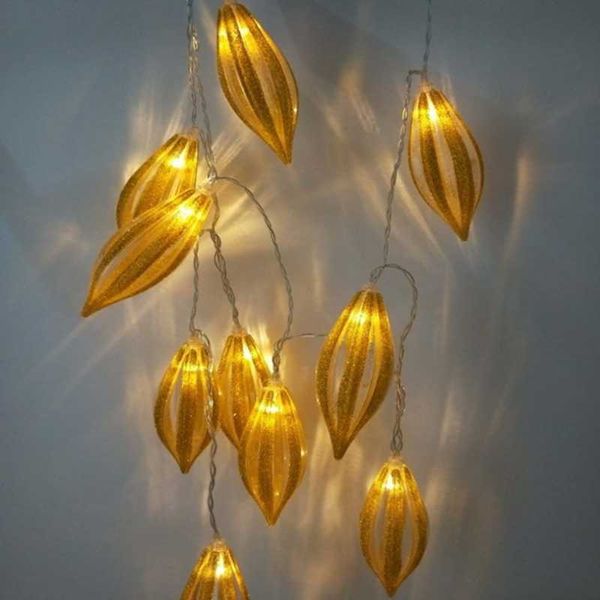 party decoration golden conical lights strung together to decorate the scene of and festival activities
party decoration golden conical lights strung together to decorate the scene of and festival activities