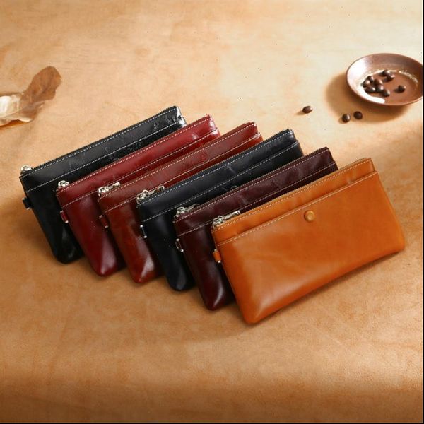 genuine real cowhide leather wallets handbag business card holder coin purse pocket women men long zipper wristlet clutch, Red;black
genuine real cowhide leather wallets handbag business card holder coin purse pocket women men long zipper wristlet clutch, Red;black