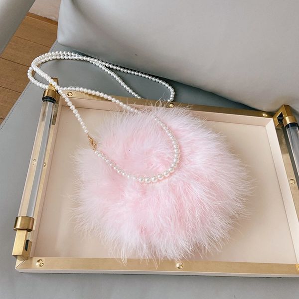 autumn and winter fur ostrich fashion pearl chicken feather portable slanting cross lady dinner bag
autumn and winter fur ostrich fashion pearl chicken feather portable slanting cross lady dinner bag
