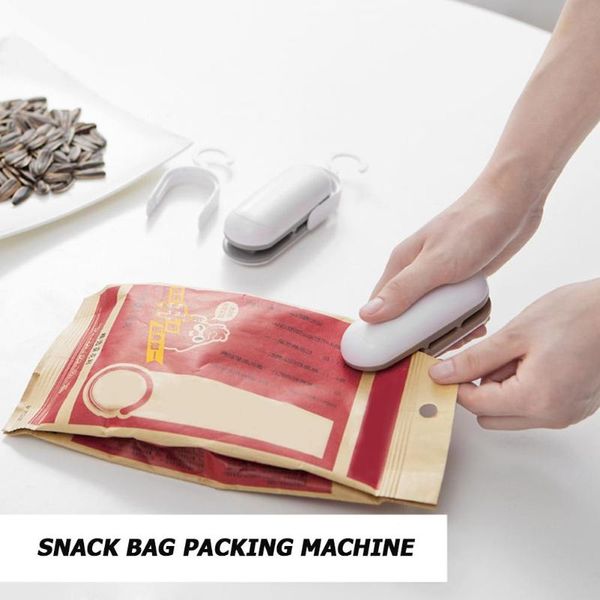 bag clips mini handheld electric heating snack vacuum sealing machine hand pressure plastic packaging kitchen tool accessories
bag clips mini handheld electric heating snack vacuum sealing machine hand pressure plastic packaging kitchen tool accessories