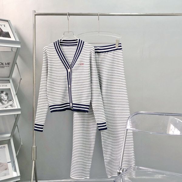 design clothing 21 autumn celebrity navy blue stripe women's v-neck cardigan knitted suit high waist horn pants qingdao jimo, White
design clothing 21 autumn celebrity navy blue stripe women's v-neck cardigan knitted suit high waist horn pants qingdao jimo, White