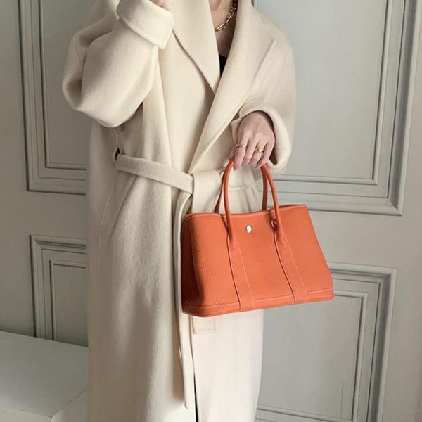lomantina 100% genuine cowhide leather luxury handbag designer garden party tote bag women famous brand
lomantina 100% genuine cowhide leather luxury handbag designer garden party tote bag women famous brand
