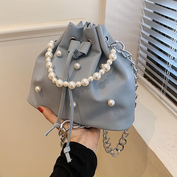 evening bags pearl handle drawstring bucket bag 2021 summer quality pu leather women's designer handbag chain shoulder messenger
evening bags pearl handle drawstring bucket bag 2021 summer quality pu leather women's designer handbag chain shoulder messenger