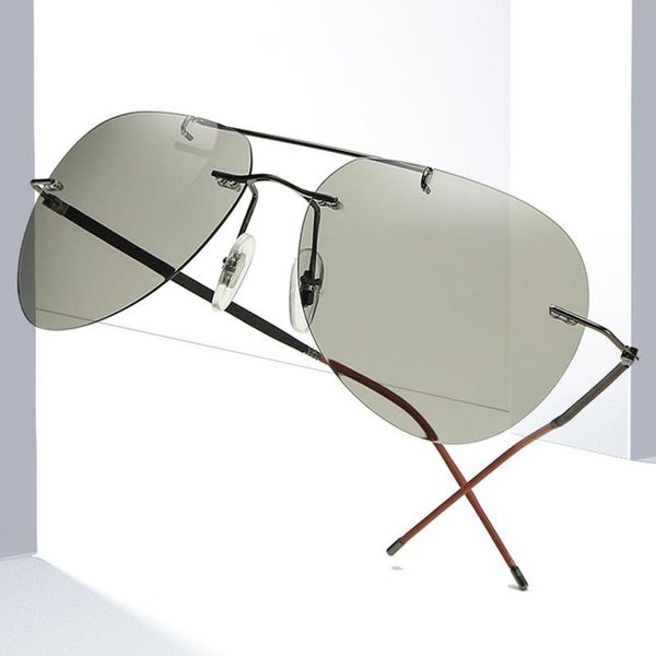 ultra-light rimless sunglasses for men pochromic eyeglass driver polarizing lens sun glasses, White;black
ultra-light rimless sunglasses for men pochromic eyeglass driver polarizing lens sun glasses, White;black
