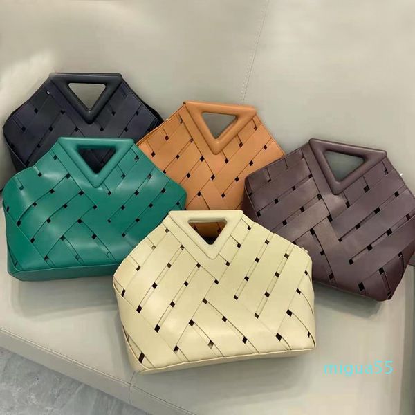 inverted triangle hollowed out hand niche design leather vegetable basket women's bag trend
inverted triangle hollowed out hand niche design leather vegetable basket women's bag trend