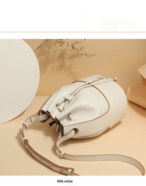 design hand female 2021 new european and american big-name fashion wild large-capacity drawstring bucket shoulder messenger bag
design hand female 2021 new european and american big-name fashion wild large-capacity drawstring bucket shoulder messenger bag