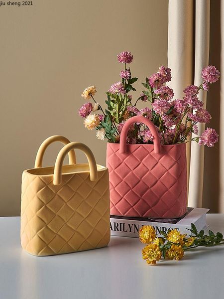 vases european-style ceramic handbag flower creative big mouth arrangement living room dining table vase home decoration
vases european-style ceramic handbag flower creative big mouth arrangement living room dining table vase home decoration