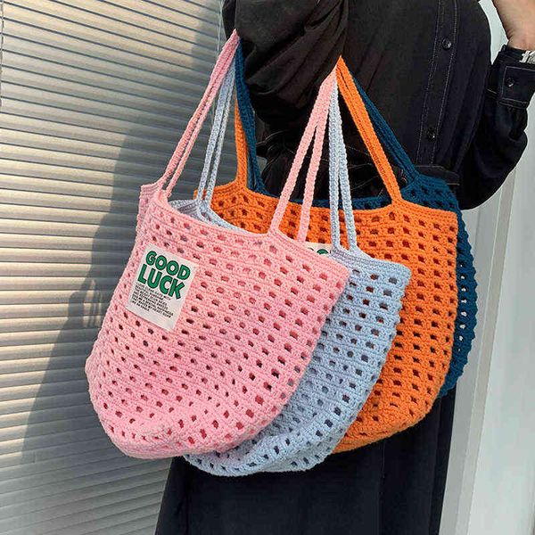 shopping bags hollow knitted large capacity tote designer women shoulder handmade woven lady handbags casual summer starw big 220303
shopping bags hollow knitted large capacity tote designer women shoulder handmade woven lady handbags casual summer starw big 220303