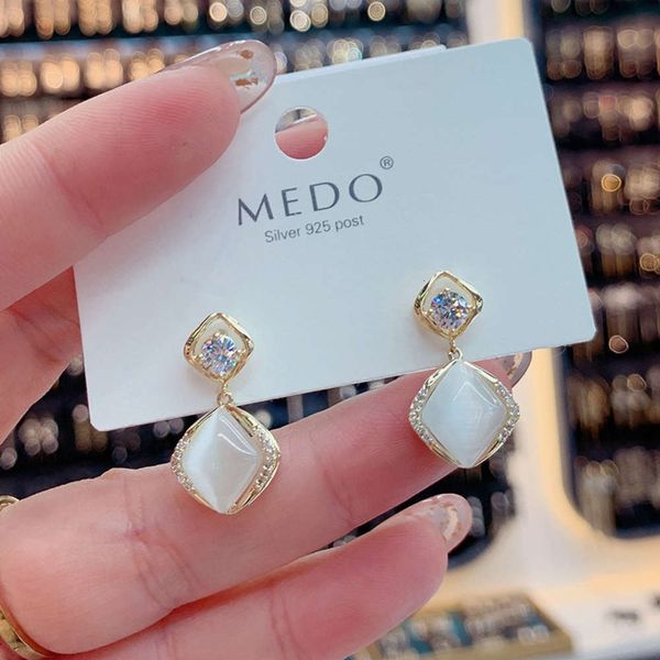 korean super fairy delicate cat's eye stone small simple design fashion versatile silver needle short earrings for women, Black
korean super fairy delicate cat's eye stone small simple design fashion versatile silver needle short earrings for women, Black