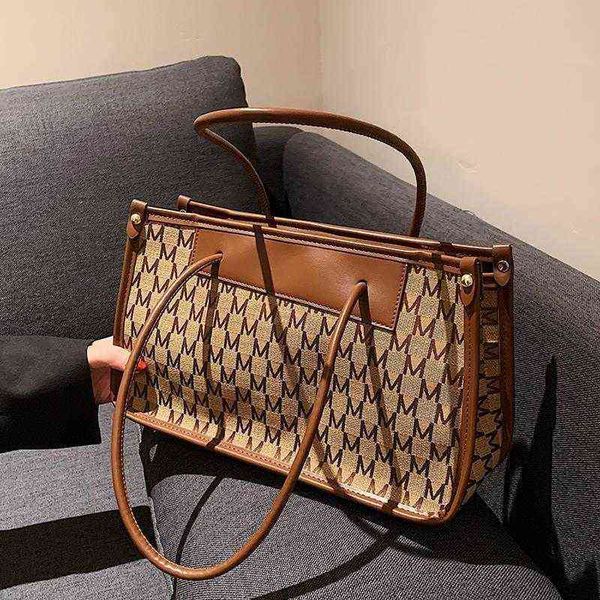 large capacity bag women's 2021 fashion canvas shoulder autumn and winter minority design portable tote
large capacity bag women's 2021 fashion canvas shoulder autumn and winter minority design portable tote