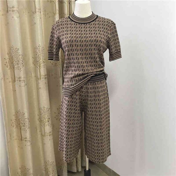 design clothing early and summer new color contrast letter jacquard knitted ice silk pullover short sleeve 5-point pants set, White
design clothing early and summer new color contrast letter jacquard knitted ice silk pullover short sleeve 5-point pants set, White