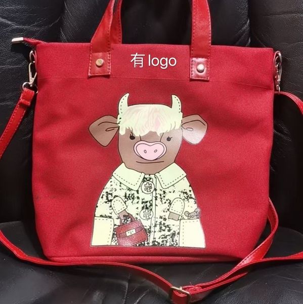 2021 new tb year of the ox one shoulder messenger bag red hand letter printed canvas shopping bag 
2021 new tb year of the ox one shoulder messenger bag red hand letter printed canvas shopping bag