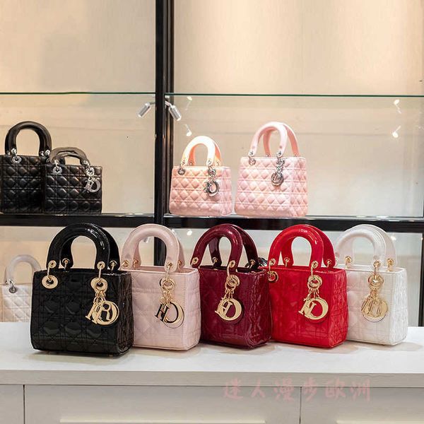 di lady patent leather three lattice mini chain princess bag one shoulder messenger
di lady patent leather three lattice mini chain princess bag one shoulder messenger