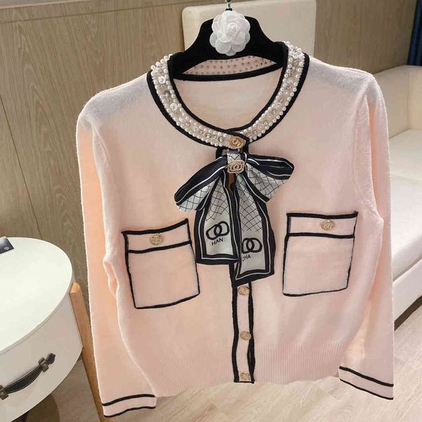 luxury2021 womens sweaters knitted cardigan with ribbon sweater autumn female sweater coat, White;black
luxury2021 womens sweaters knitted cardigan with ribbon sweater autumn female sweater coat, White;black