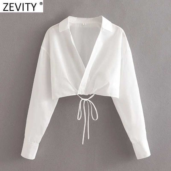 zevity women cross v neck hem bandage short slim smock blouse femme long sleeve knotted white shirt roupas chic ls9099 210603
zevity women cross v neck hem bandage short slim smock blouse femme long sleeve knotted white shirt roupas chic ls9099 210603