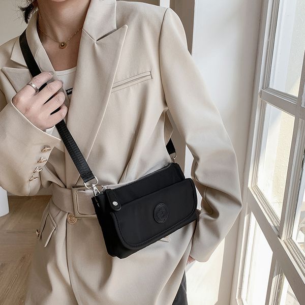 mini bag women's large capacity nylon leisure one shoulder cross small square light mobile phone
mini bag women's large capacity nylon leisure one shoulder cross small square light mobile phone