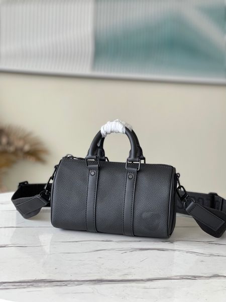 small travelling bag. full grain cowhide. soft texture, dotted with matte metal letters. leather handle and detachable jacquard strap, size:
small travelling bag. full grain cowhide. soft texture, dotted with matte metal letters. leather handle and detachable jacquard strap, size: