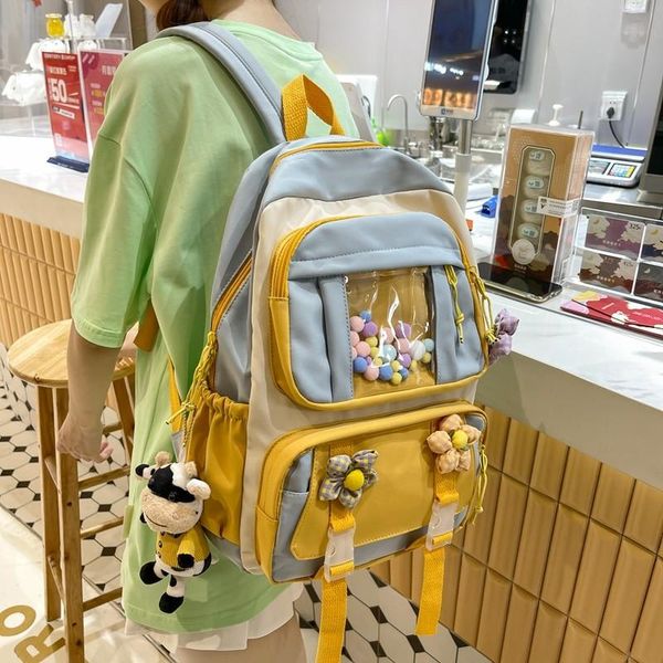 school bags fashion women's backpack contrast color nylon cute doll pendant schoolbag for girls large capacity waterproof travel backpa
school bags fashion women's backpack contrast color nylon cute doll pendant schoolbag for girls large capacity waterproof travel backpa
