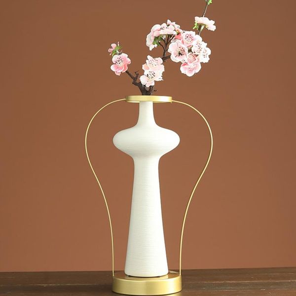 nordic luxury wrought iron ceramic vase ornaments living room floral arrangement decor white home decoration vases
nordic luxury wrought iron ceramic vase ornaments living room floral arrangement decor white home decoration vases