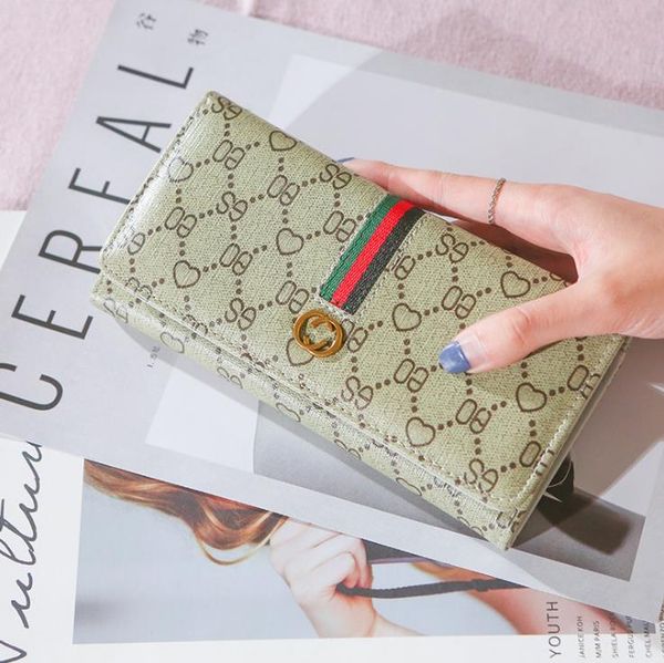 european and american printed bags long folding women's wallet 2021 spring/summer fashion clutch all-match wallets
european and american printed bags long folding women's wallet 2021 spring/summer fashion clutch all-match wallets