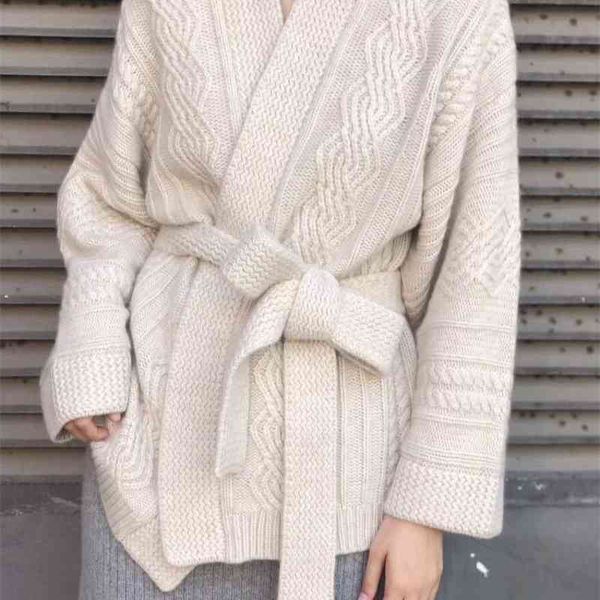 autumn and winter 2021 new cashmere women's solid color knitting cardigan loose lace up sweater wool warm jacket, White;black
autumn and winter 2021 new cashmere women's solid color knitting cardigan loose lace up sweater wool warm jacket, White;black