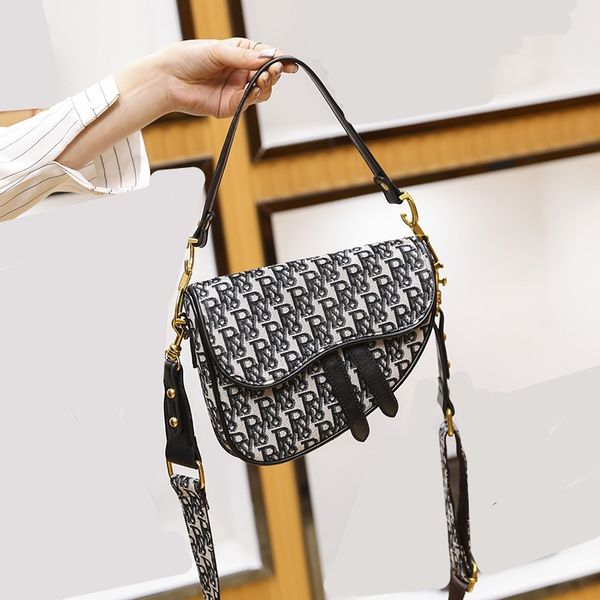 design saddle female messenger single shoulder broadband new fashion versatile flower underarm bag handbags
design saddle female messenger single shoulder broadband new fashion versatile flower underarm bag handbags