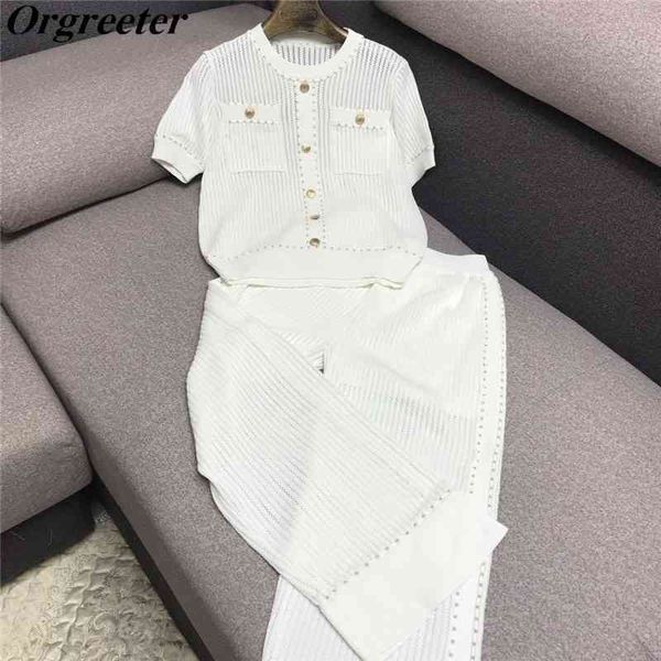 temperament wide leg pants suit female summer metal buckle hollow short-sleeved sweater + pants two-piece set 210525, White
temperament wide leg pants suit female summer metal buckle hollow short-sleeved sweater + pants two-piece set 210525, White