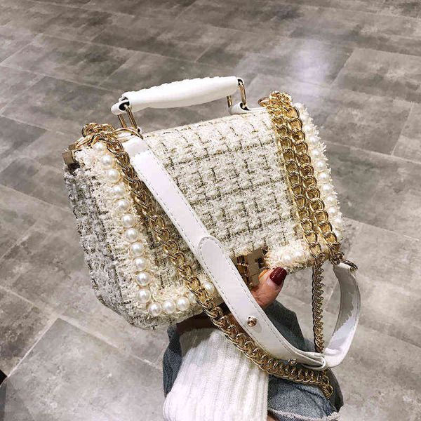 shopping bags quality woolen pearl flap crossbody bags for women luxury designer small square shoulder handbags and purses female tote bag 2
shopping bags quality woolen pearl flap crossbody bags for women luxury designer small square shoulder handbags and purses female tote bag 2