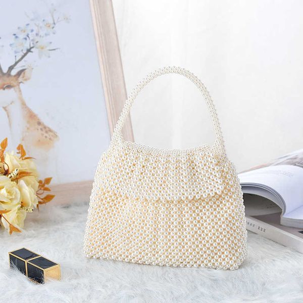 hand woven holiday bride dinner bag, clamshell pearl bag, handbag 
hand woven holiday bride dinner bag, clamshell pearl bag, handbag