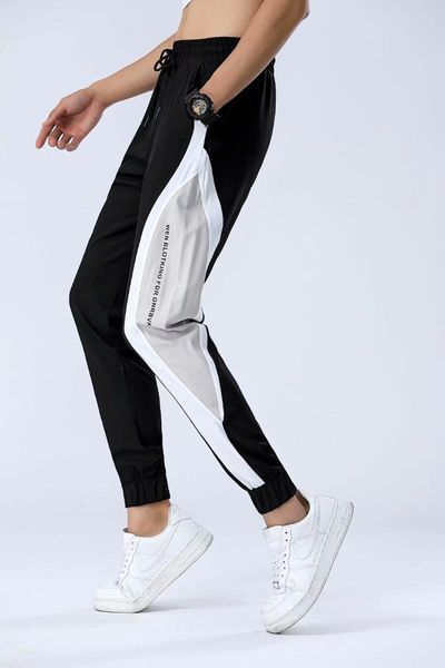 hip hop side button sports pants men's rope fashion retro legged jogging basketball half running, Black;blue
hip hop side button sports pants men's rope fashion retro legged jogging basketball half running, Black;blue