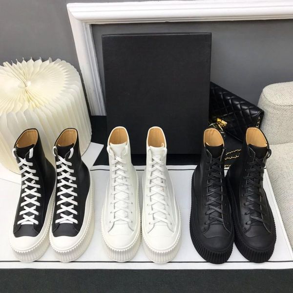boots winter women's increased thick-soled big round head cross strap black and white fashion
boots winter women's increased thick-soled big round head cross strap black and white fashion