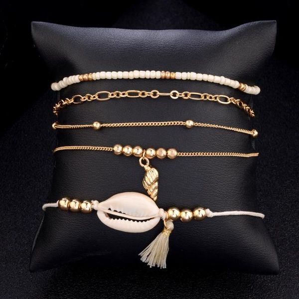 charm bracelets 5pcs women fashion conch shell beads tassels chain leather gold bracelet set personality beach party clothing accessories#28, Golden;silver
charm bracelets 5pcs women fashion conch shell beads tassels chain leather gold bracelet set personality beach party clothing accessories#28, Golden;silver