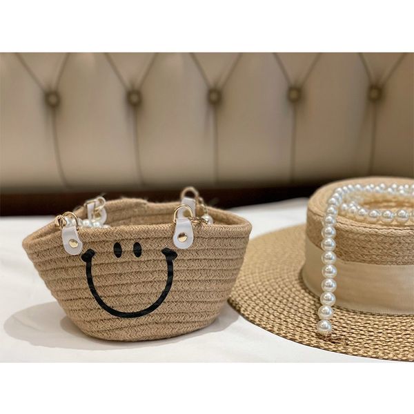 summer new simple smiling face knitting beach vegetable basket holiday series women's storage bags
summer new simple smiling face knitting beach vegetable basket holiday series women's storage bags