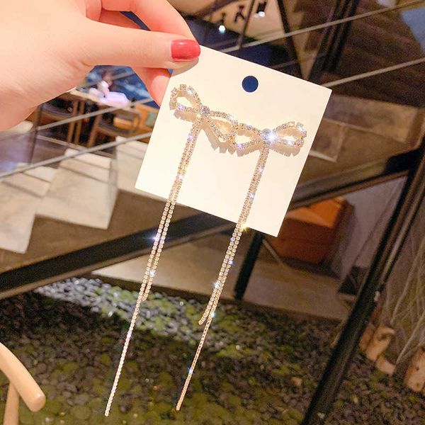 925 silver needle bow earrings women's fashion temperament fashion super long diamond tassel net red earrings
925 silver needle bow earrings women's fashion temperament fashion super long diamond tassel net red earrings