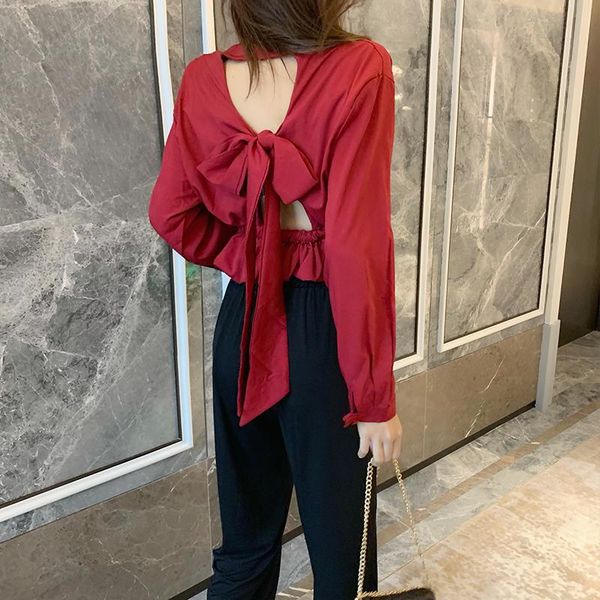 ladies blouse 2021 autumn korean long sleeved turn-down collar slim solid hollow out backless lace up shirt women women's blouses, White
ladies blouse 2021 autumn korean long sleeved turn-down collar slim solid hollow out backless lace up shirt women women's blouses, White