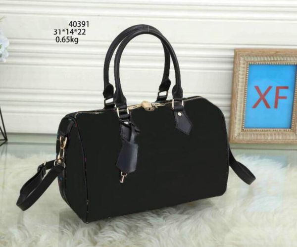 women messenger travel bag classic style fashion designer duffel bags shoulder bags lady totes handbags 31 cm with key lock
women messenger travel bag classic style fashion designer duffel bags shoulder bags lady totes handbags 31 cm with key lock