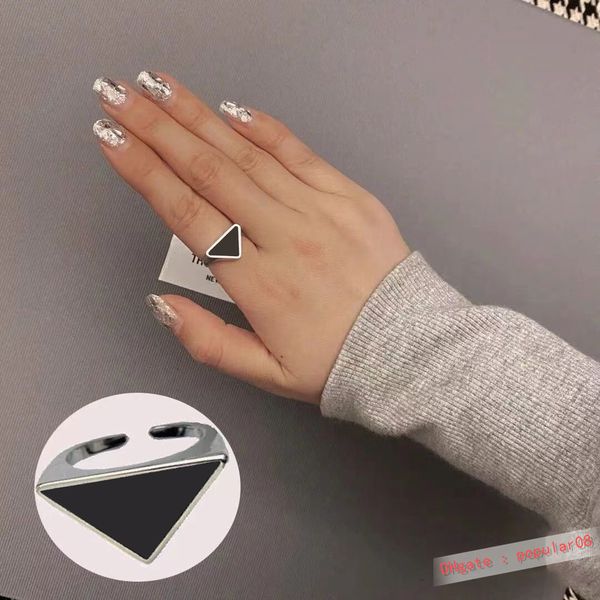 fashion designers ring women charm jewely women's and men's triangle rings couple letter open bandring cool punk style good, Silver
fashion designers ring women charm jewely women's and men's triangle rings couple letter open bandring cool punk style good, Silver