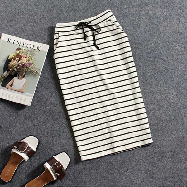 2021 summer pure cotton black and white stripes casual pocket mid-length bag hip pencil one step half-length skirt ladies skirt y0824
2021 summer pure cotton black and white stripes casual pocket mid-length bag hip pencil one step half-length skirt ladies skirt y0824