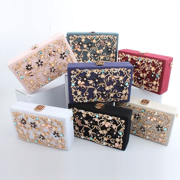 fashion evening bag autumn and winter linen fabric hollow inlaid diamond alloy flower hand holding small square wedding dinner
fashion evening bag autumn and winter linen fabric hollow inlaid diamond alloy flower hand holding small square wedding dinner