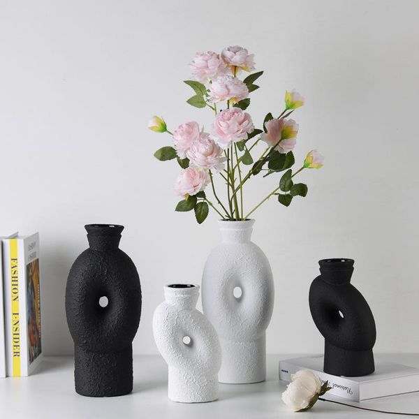 vases modern and simple black geometric flower arrangement creative exhibition hall home living room desksoft decoration crafts
vases modern and simple black geometric flower arrangement creative exhibition hall home living room desksoft decoration crafts