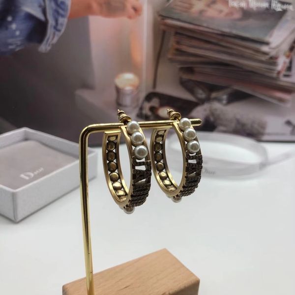 special offer 2021 luxury designer jewelry family's new letter pearl open earrings female temperament fashion trend, Silver
special offer 2021 luxury designer jewelry family's new letter pearl open earrings female temperament fashion trend, Silver