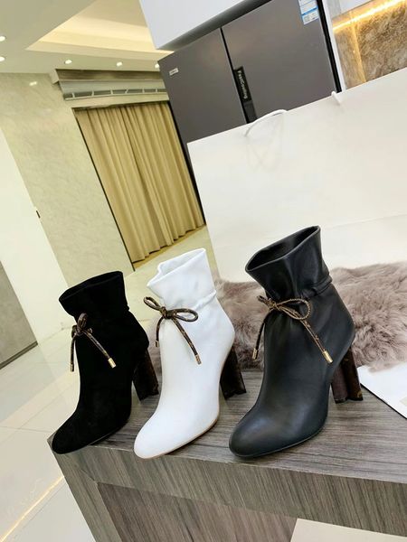 fashion boots high heel temperament cowhide real leather black white classic plum blossom heels letter slip on ankle booties size 34-42
fashion boots high heel temperament cowhide real leather black white classic plum blossom heels letter slip on ankle booties size 34-42