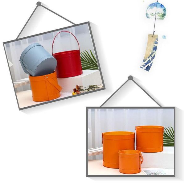 gift wrap portable leather hug bucket flower box round hand packaging birthday wedding candy
gift wrap portable leather hug bucket flower box round hand packaging birthday wedding candy