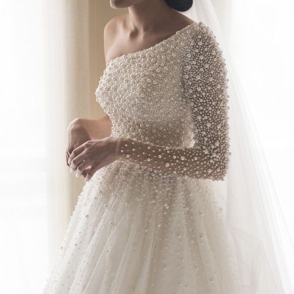one shoulder long sleeves pearls arabic dubai wedding dress luxurious beading iovry bridal gownsvestidos de mariee, White
one shoulder long sleeves pearls arabic dubai wedding dress luxurious beading iovry bridal gownsvestidos de mariee, White