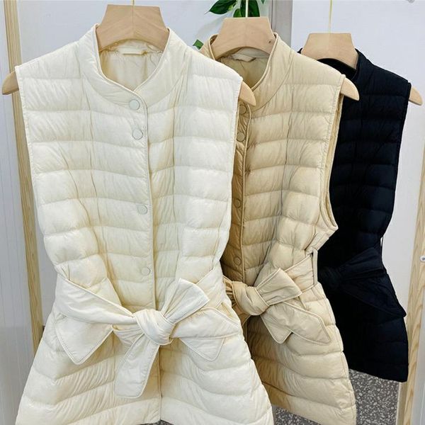 women's vests 2022 winter women light down long vest with simple casual belt autumn warm waistcoat gilet stand collar korean style ae75, Black;white
women's vests 2022 winter women light down long vest with simple casual belt autumn warm waistcoat gilet stand collar korean style ae75, Black;white
